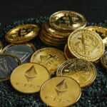a pile of bitcoins sitting on top of a pile of gravel