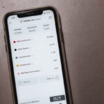 white samsung android smartphone on brown table