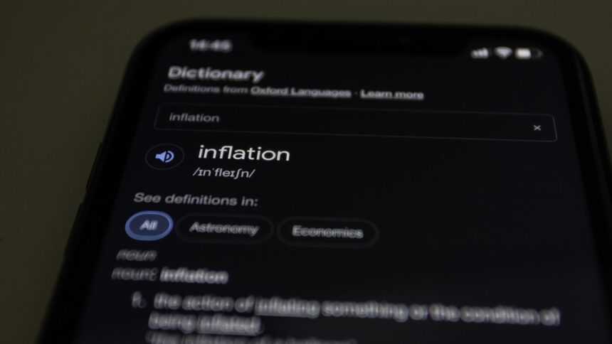 a close up of a cell phone with information on the screen