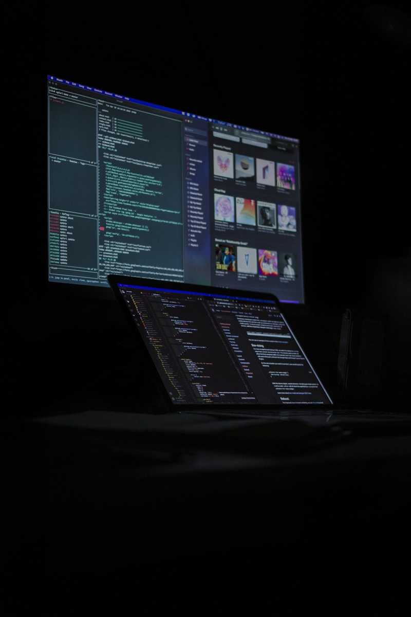 a laptop computer sitting on top of a desk