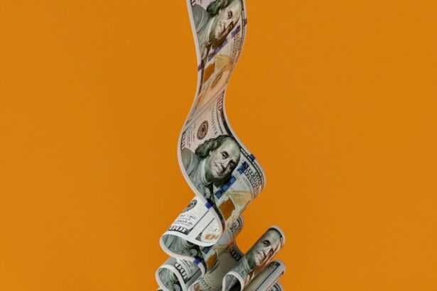 a stack of money sitting on top of a table