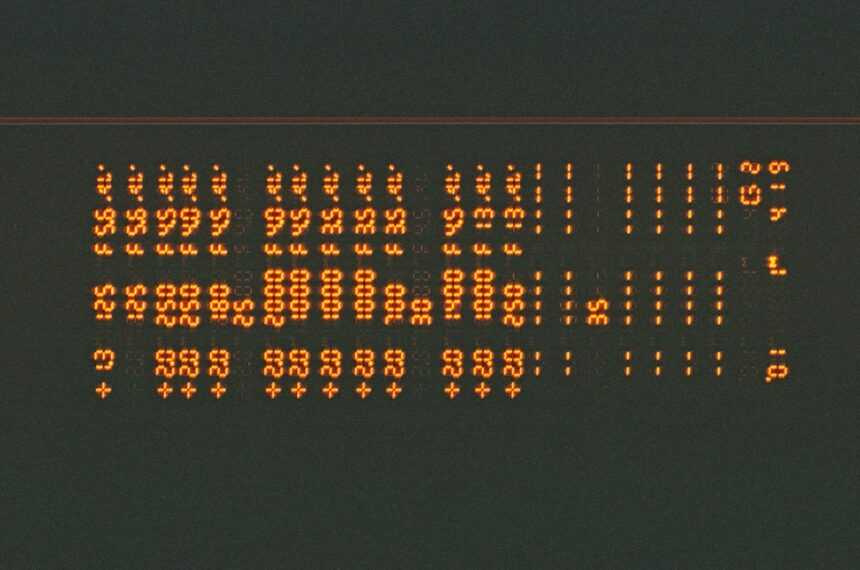 a close up of a sign with numbers on it