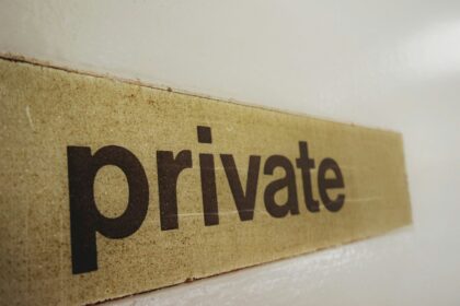 a wooden sign that says private on it