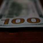 a close up of a hundred dollar bill