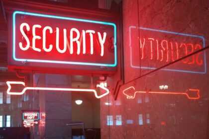 a red security sign and a blue security sign