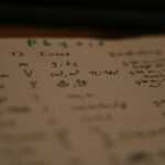 a close up of a paper with writing on it